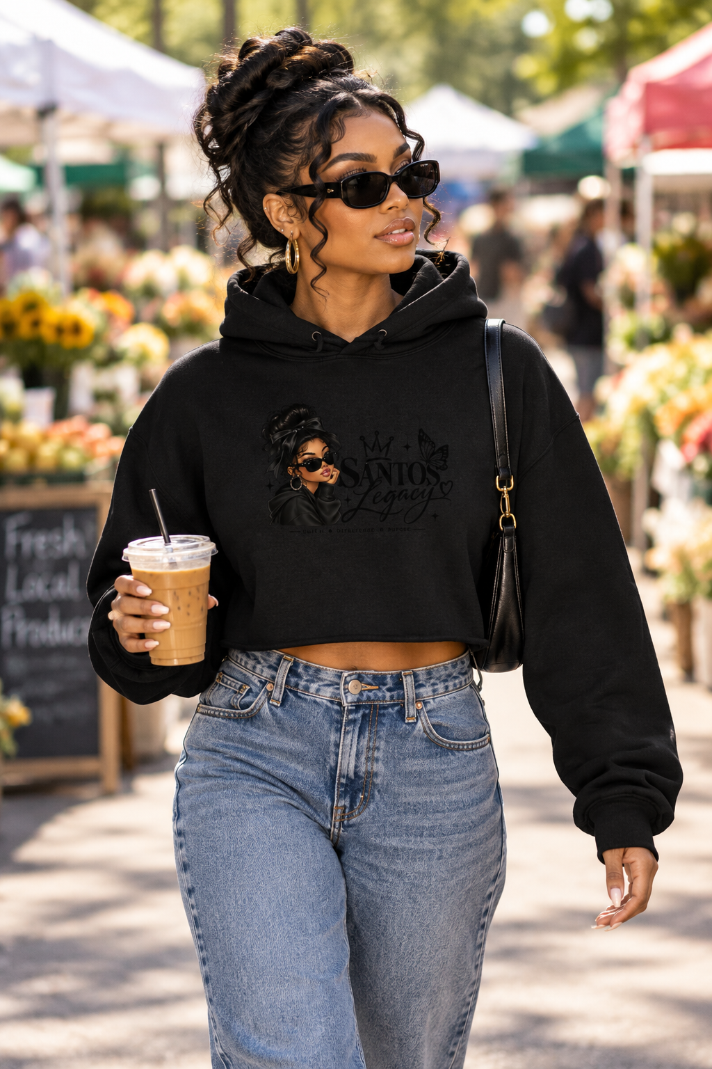 Crop hoodie: woman with iced coffee at a farmers market