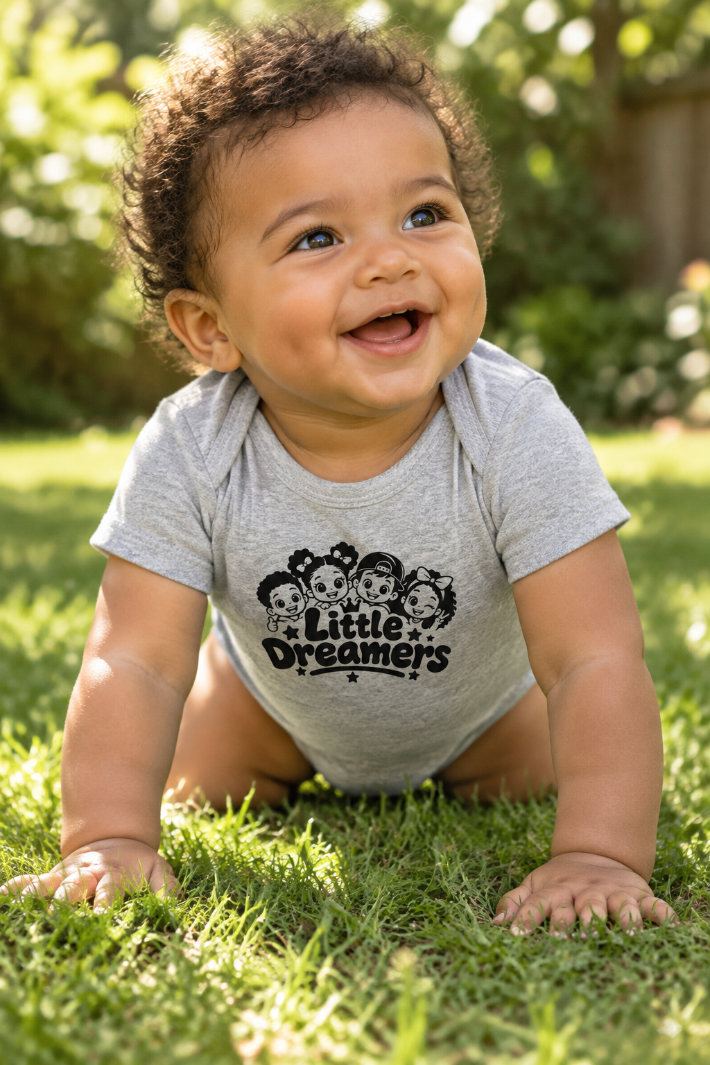 Baby wearing the Santos Legacy Baby short sleeve one piece crawling on soft green grass